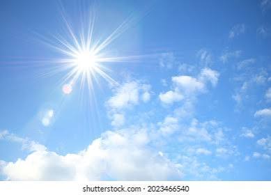 Hot and sunny day – bright sunshine and clear blue sky